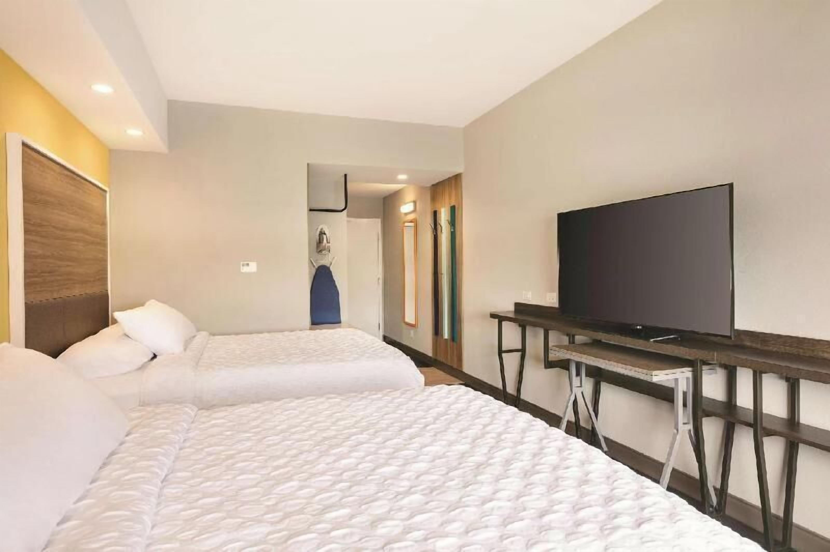 Blackout drapes, iron/ironing board, free cribs/infant beds, free WiFi