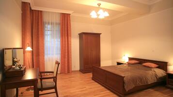 Deluxe Apartment, 3 Bedrooms | Desk, blackout drapes, soundproofing, iron/ironing board