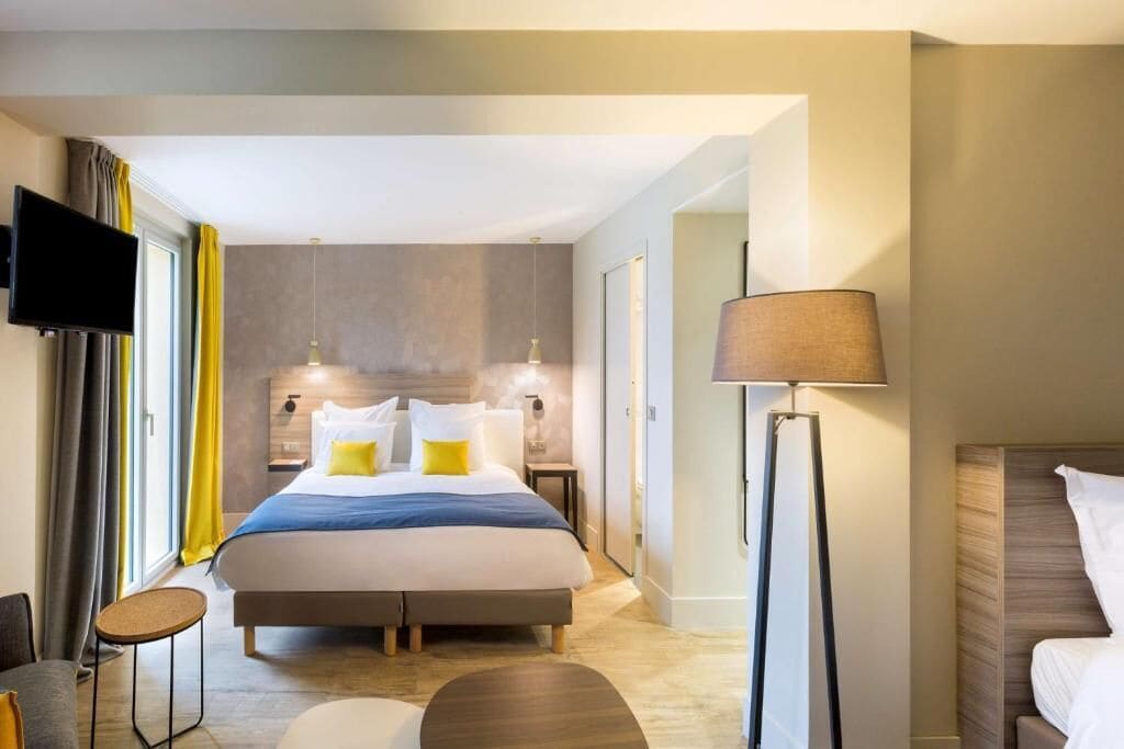 Familiekamer, meerdere bedden | Luxe beddengoed, een kluis op de kamer, individueel gedecoreerd
