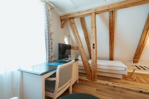 Standard Quadruple Room | 1 bedroom, in-room safe, desk, blackout drapes