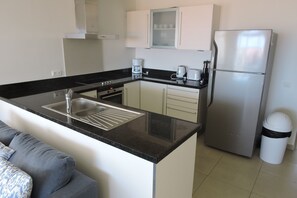 Condo | Private kitchen | Oven, stovetop, dishwasher, coffee/tea maker - Condo at Blue Bay Golf and Beach Resort (Sint Michiel)