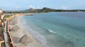 On the beach, white sand, free beach cabanas