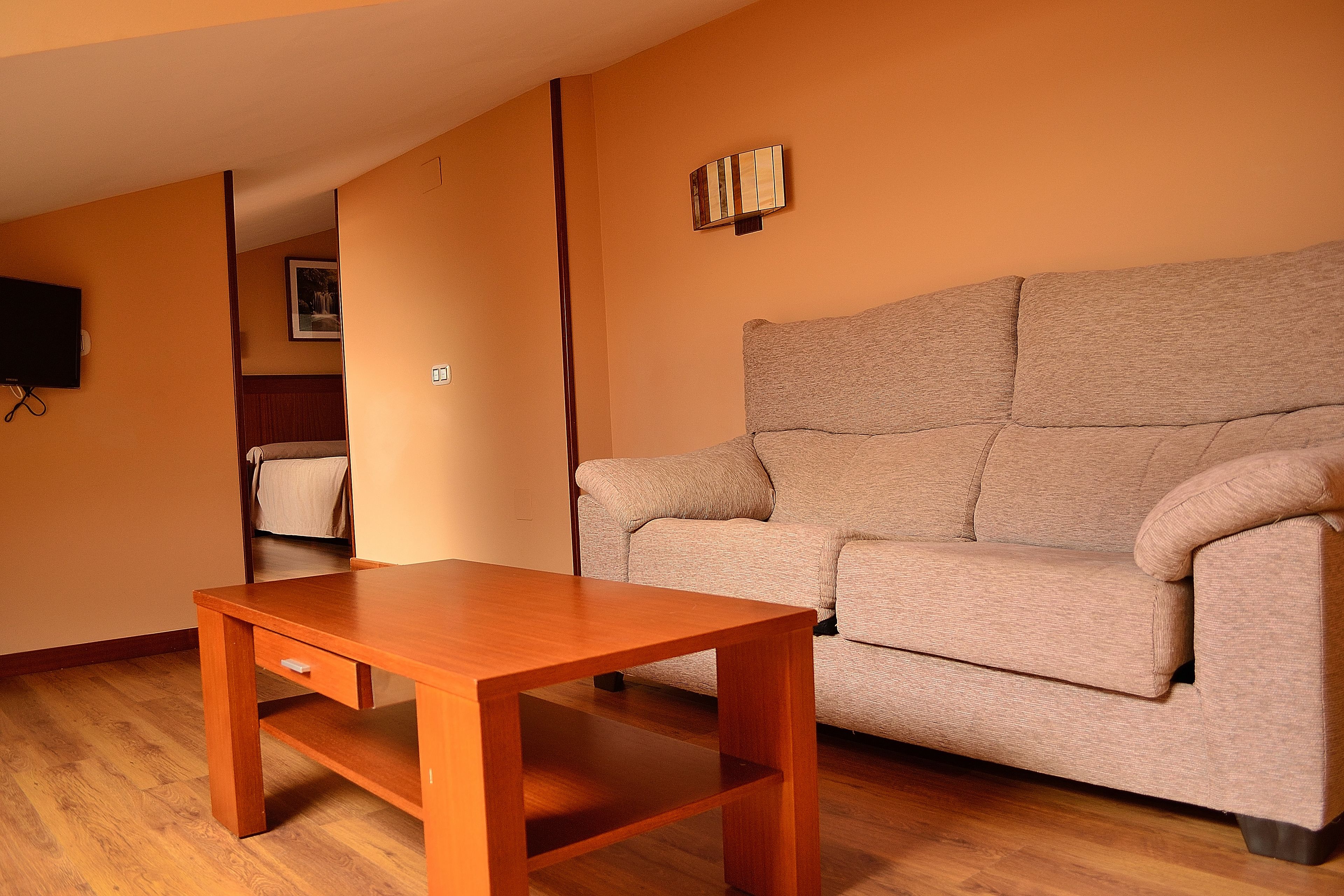 double or twin room | living room | flat-screen tv