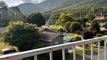 Grand Room, 2 Queen Beds, Jetted Tub, Mountain View | Terrace/patio