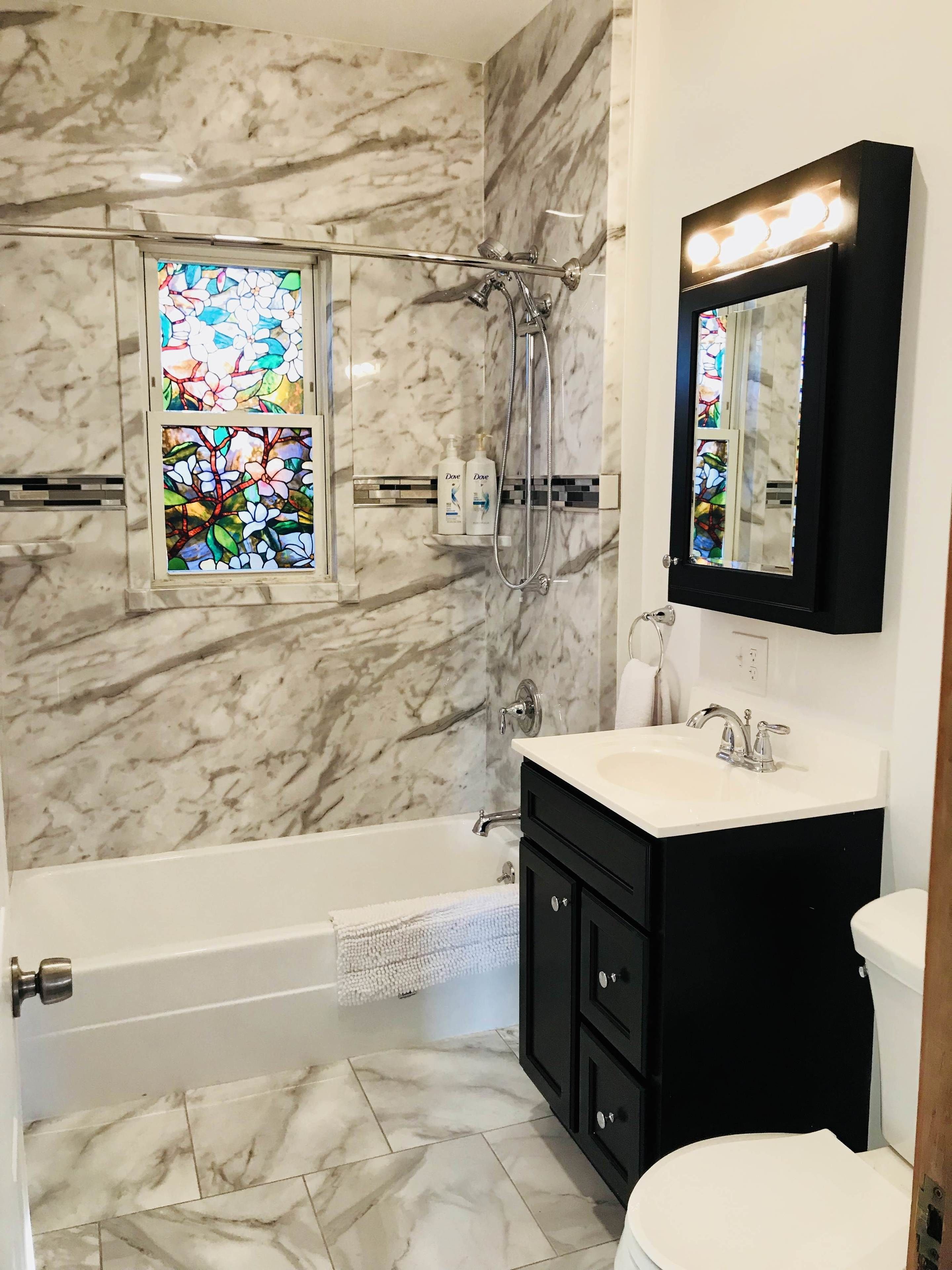 combined shower/bathtub, free toiletries, hair dryer, towels