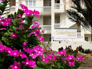 A hotel named OceanResort with balconies and a sign indicating private property.