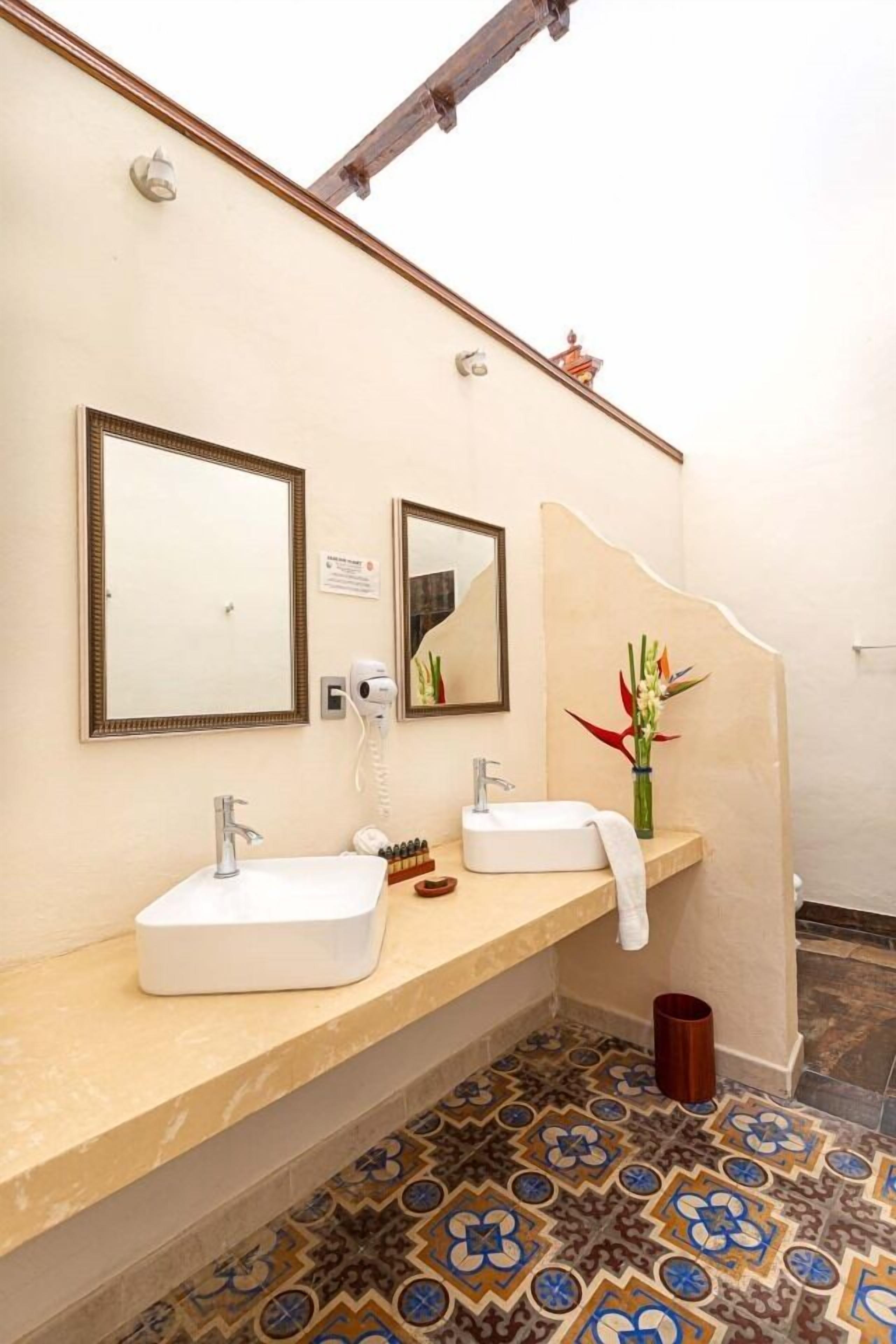 master suite | bathroom | shower, free toiletries, hair dryer, towels