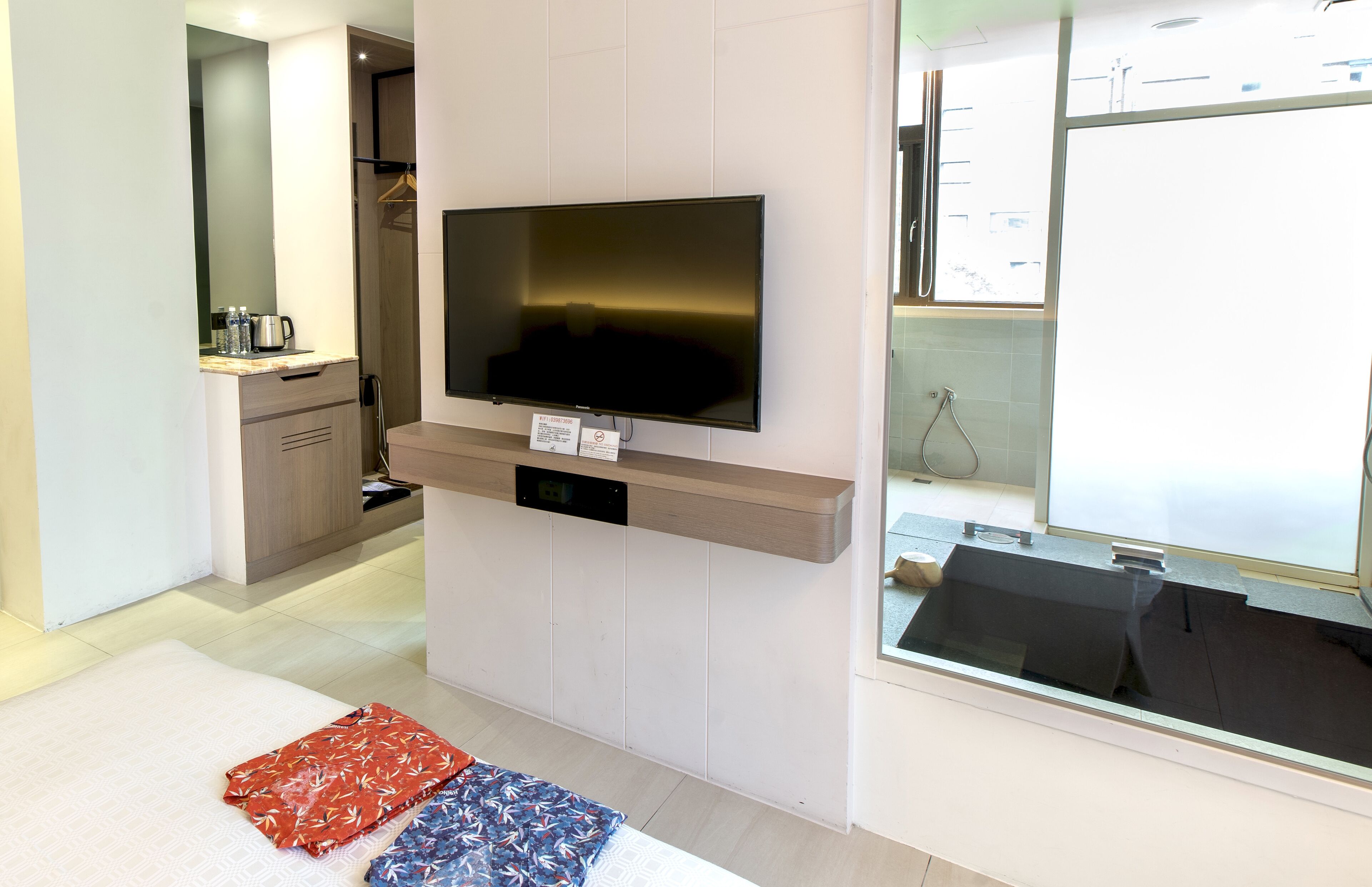 premium bedding, desk, blackout curtains, free wifi