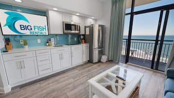 Fridge, microwave, stovetop, coffee/tea maker