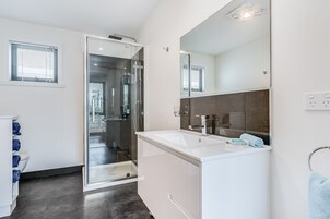 Apartment, 2 Bedrooms | Bathroom | Shower, free toiletries, hair dryer, slippers