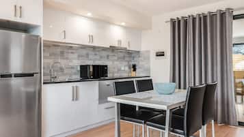 Apartment, 2 Bedrooms | Private kitchen | Full-size fridge, microwave, oven, stovetop