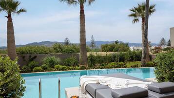 Classic Room, Pool Access | Minibar, in-room safe, desk, laptop workspace