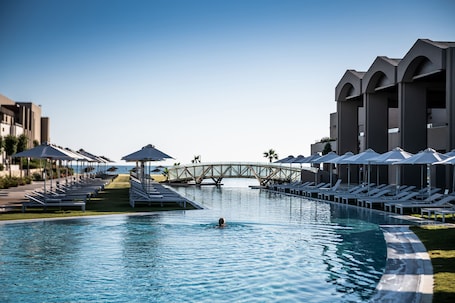 Indoor pool, outdoor pool, open 7:00 AM to 8:00 PM, cabanas (surcharge)