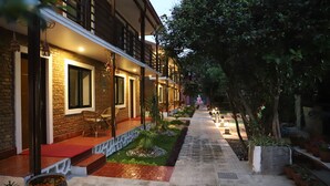 Habitación cuádruple Deluxe | Terraza o patio