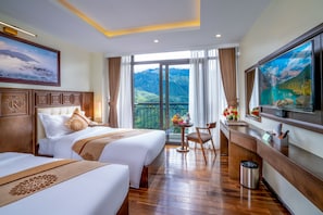 Phòng Executive | Minibar, két bảo mật tại phòng, khu vực làm việc phù hợp cho laptop