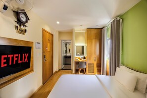 Standard Double Room | Minibar, in-room safe, desk, blackout drapes