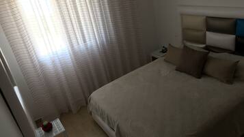 Apartment, Pool View | 2 bedrooms, individually decorated, individually furnished, desk