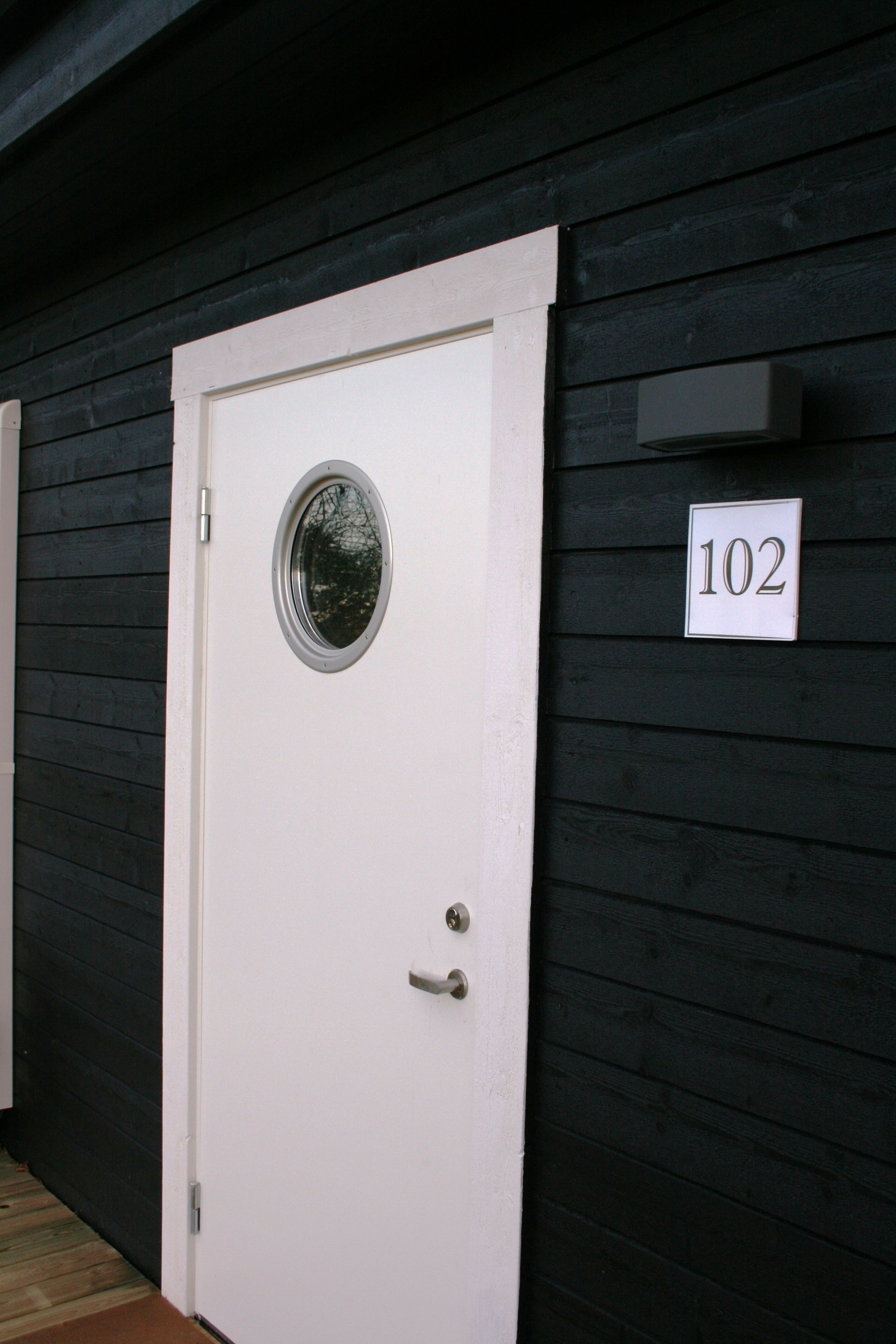 desk, laptop workspace, blackout curtains, iron/ironing board