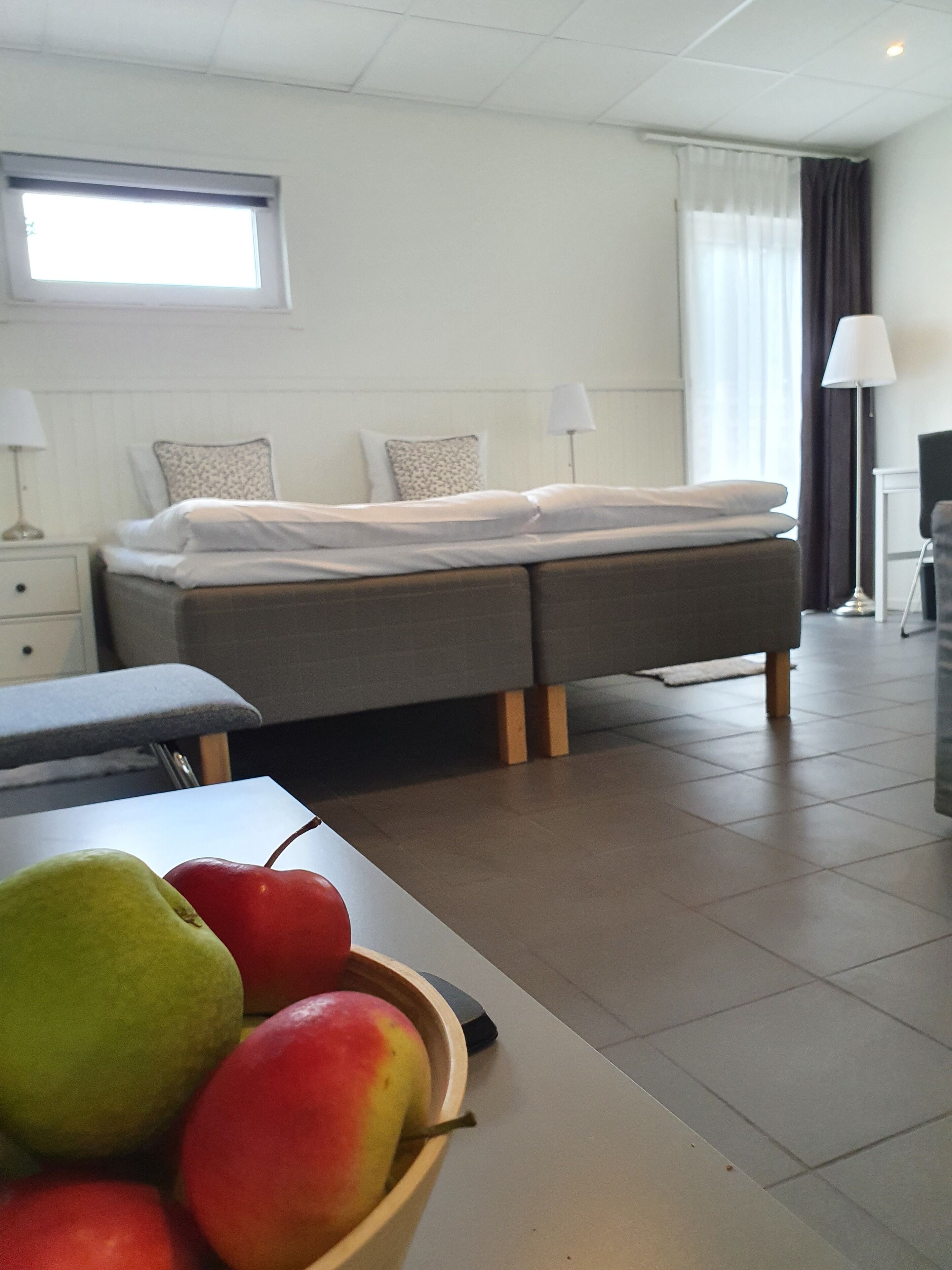 superior quadruple room, 1 bedroom | desk, laptop workspace, blackout curtains, iron/ironing board