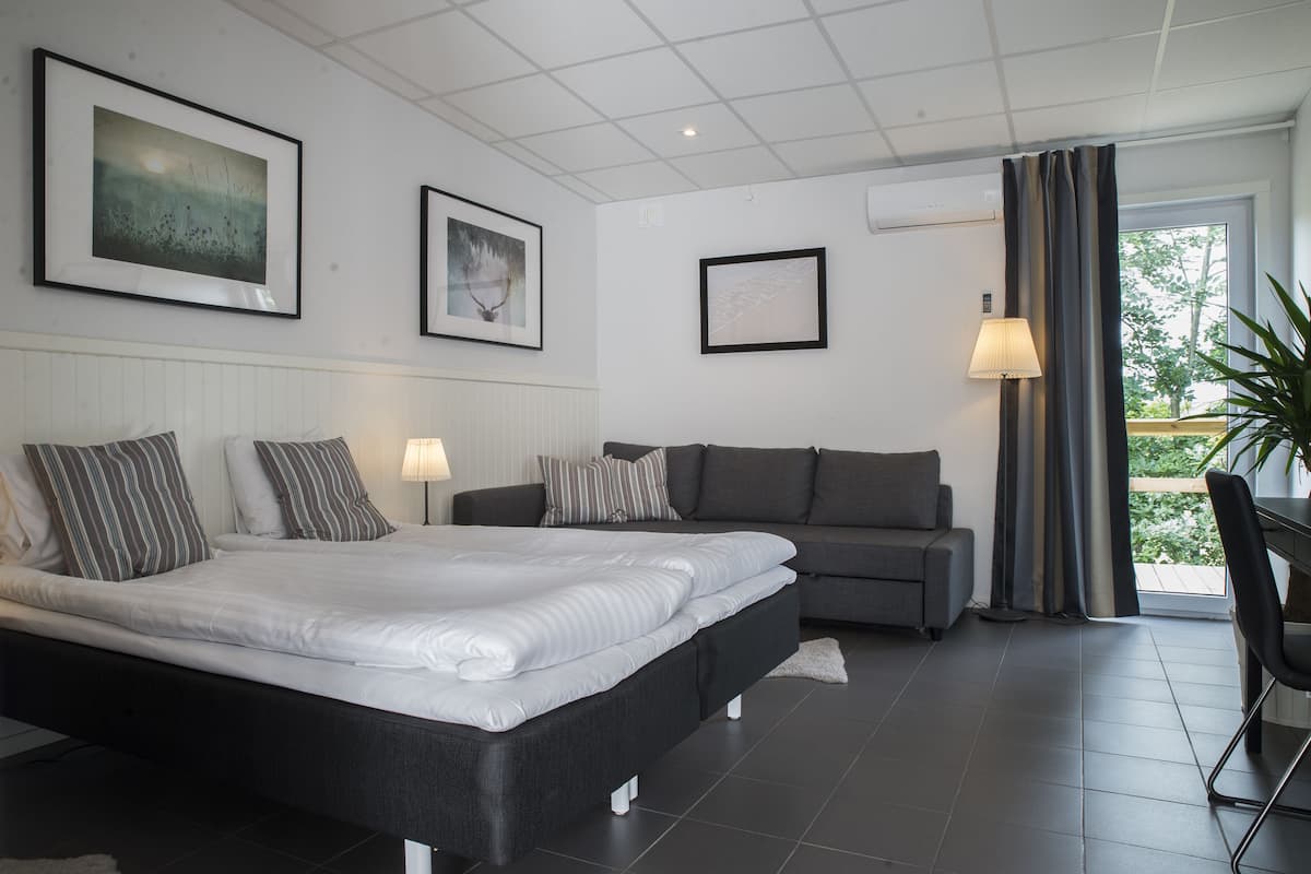 deluxe double or twin room | desk, laptop workspace, blackout curtains, iron/ironing board