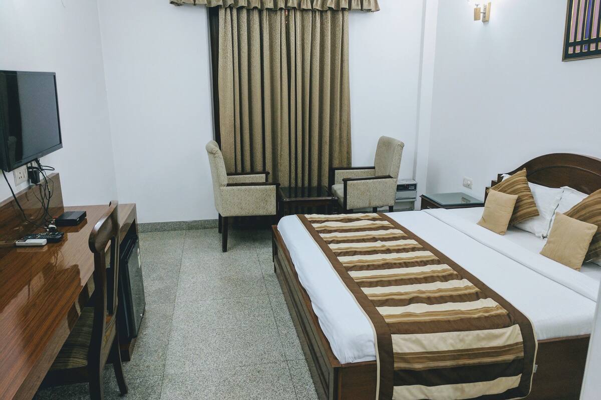Quarto premium | Frigobar, cofres nos quartos, ferros/tábuas de passar roupa