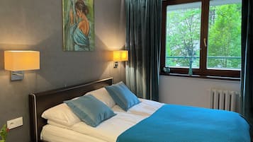 Klassieke suite, 1 slaapkamer, niet-roken, kitchenette (Black Jack) | 1 slaapkamer, luxe beddengoed, verduisterende gordijnen