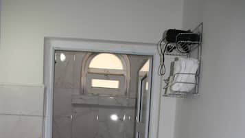 Shower, free toiletries, hair dryer, slippers