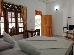 Basic Double Room, 2 Bedrooms, Garden View | 3 bedrooms, premium bedding, in-room safe, desk