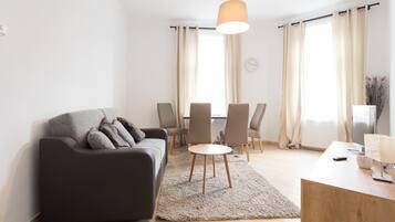 Apartment, 1 Bedroom (TOP 14) | Living room | 40-inch flat-screen TV with satellite channels, TV