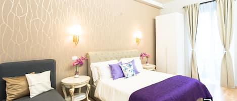 Deluxe Quadruple Room, Balcony | Premium bedding, down duvets, memory-foam beds, minibar