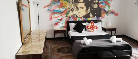 Family Room, Shared Bathroom | Desk, soundproofing, iron/ironing board, free cribs/infant beds