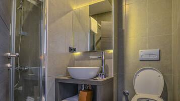 Shower, free toiletries, hair dryer, slippers