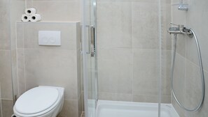 Apartment, 2 Bedrooms | Bathroom | Shower, free toiletries, hair dryer, towels