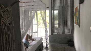 Family Suite, Private Bathroom, Pool View | In-room safe, iron/ironing board, rollaway beds, free WiFi