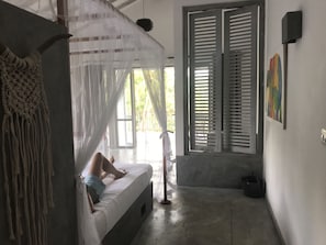 Family Suite, Private Bathroom, Pool View | In-room safe, iron/ironing board, rollaway beds, free WiFi
