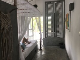 Family Suite, Private Bathroom, Pool View | In-room safe, iron/ironing board, rollaway beds, free WiFi
