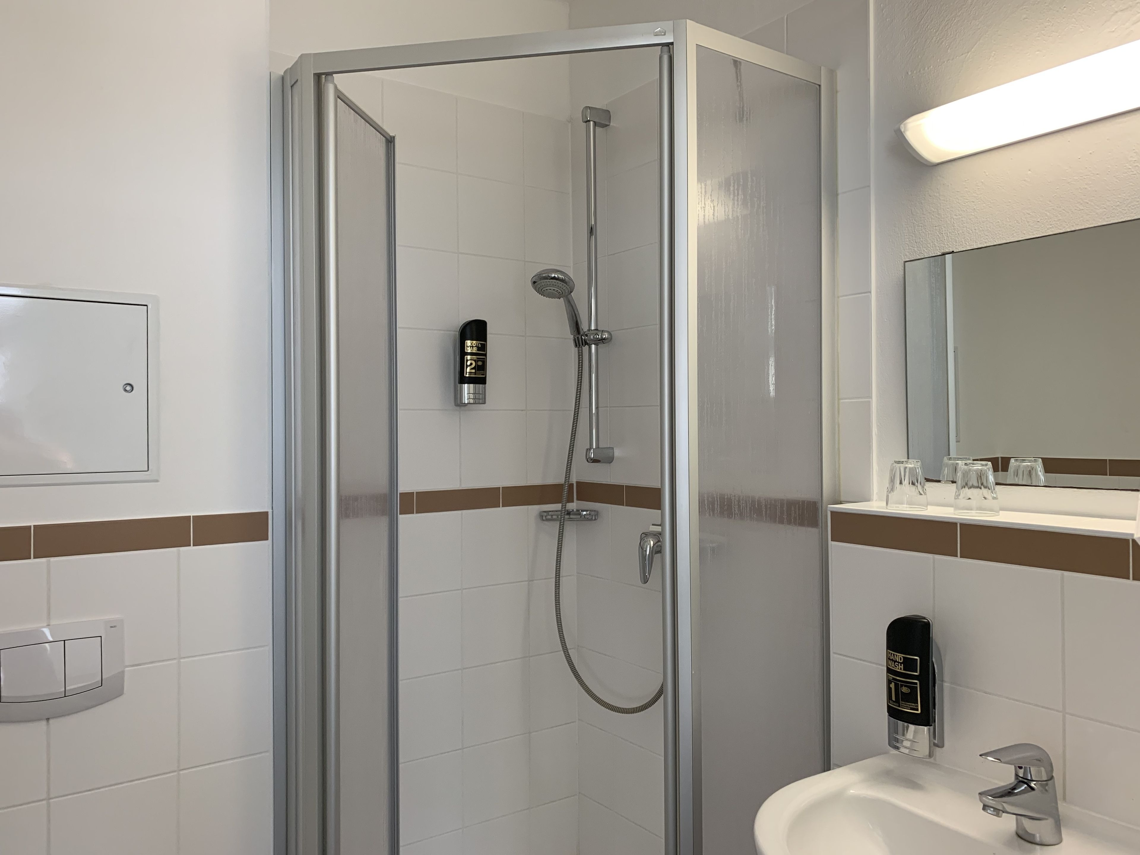 shower, free toiletries, hair dryer, towels