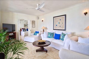 Room, 5 Bedrooms | Living area | Flat-screen TV