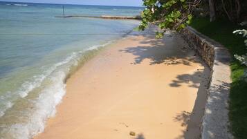 On the beach, white sand