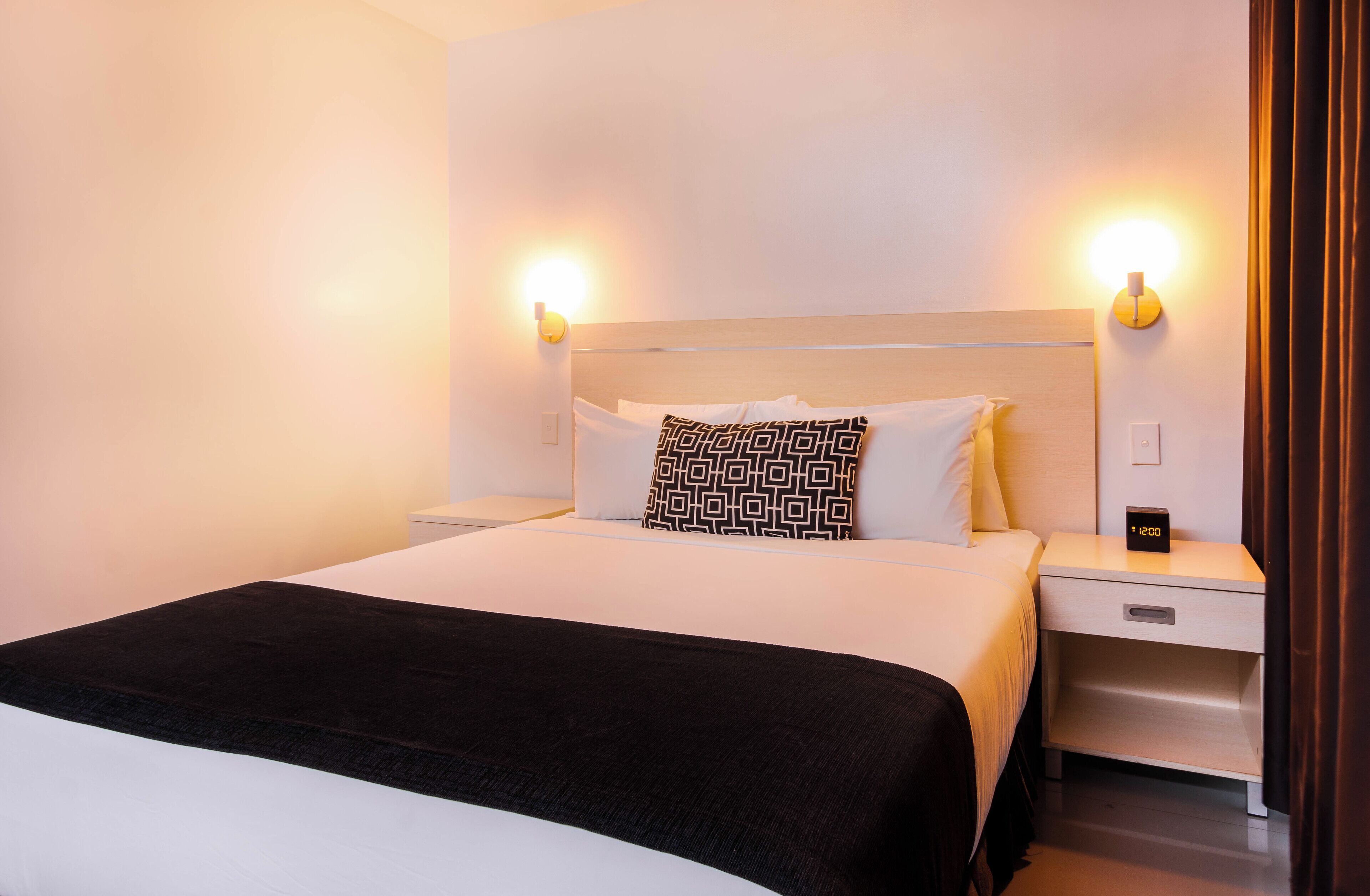 deluxe double room, 1 queen bed | select comfort beds, in-room safe, desk, blackout curtains