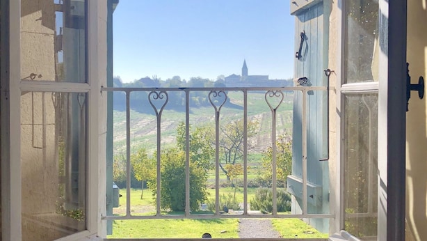 An open balcony with a view of a green landscape and distant buildings. - Pretty Farmhouse / Private pool / 4 Doubles with en-suites & 1 Twin  / Sleeps 10 (Saint-Séverin)