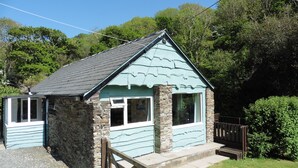 A small stone cottage with a sloped roof, a wooden gate, and a grassy yard. - The Old Shippon, Crackington Haven, Bude, Cornwall, walk to the Beach Pub. (Crackington Haven)