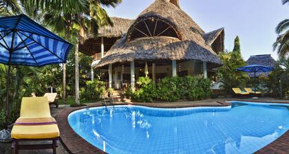 Large luxury beachside villa with a pool, guesthouse, cook, gardener, and maid