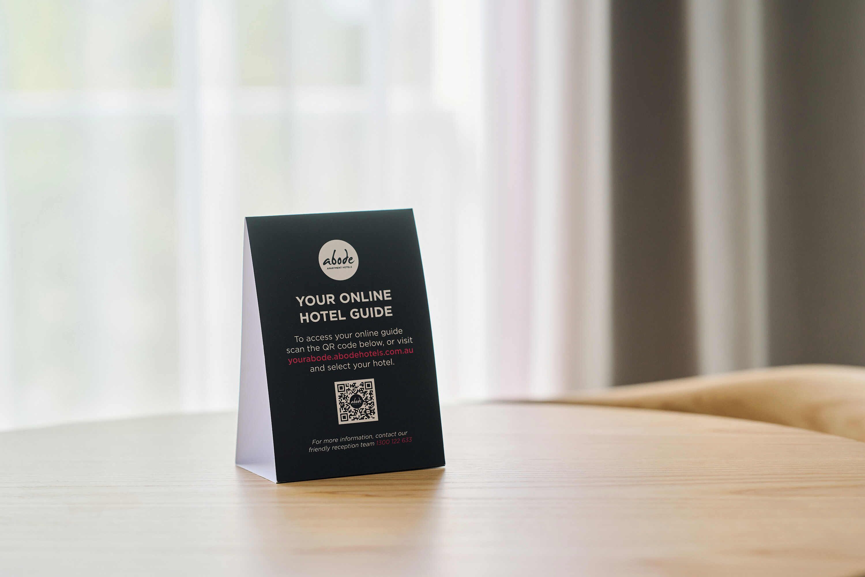 desk, laptop workspace, blackout curtains, iron/ironing board