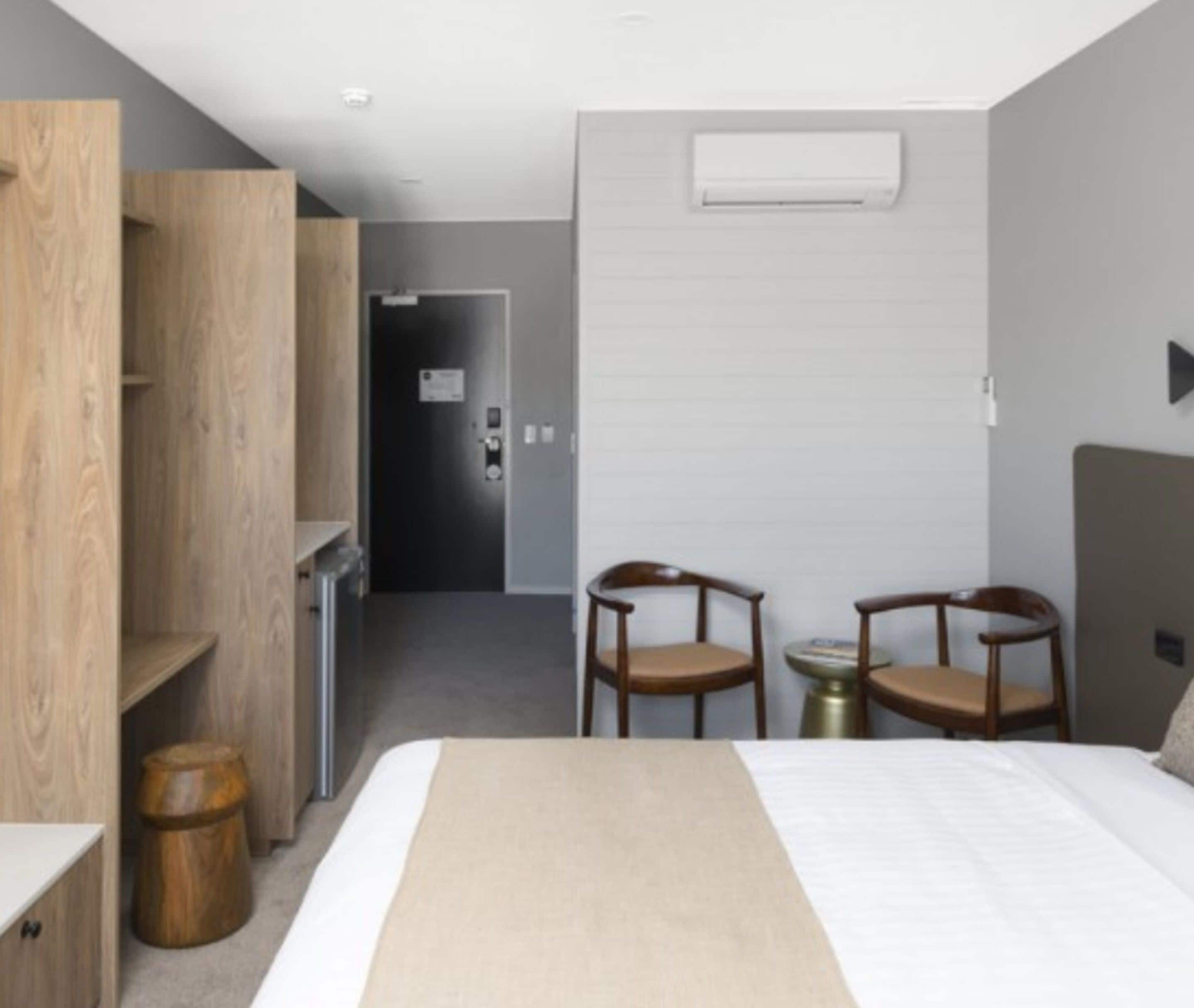 desk, laptop workspace, blackout curtains, iron/ironing board