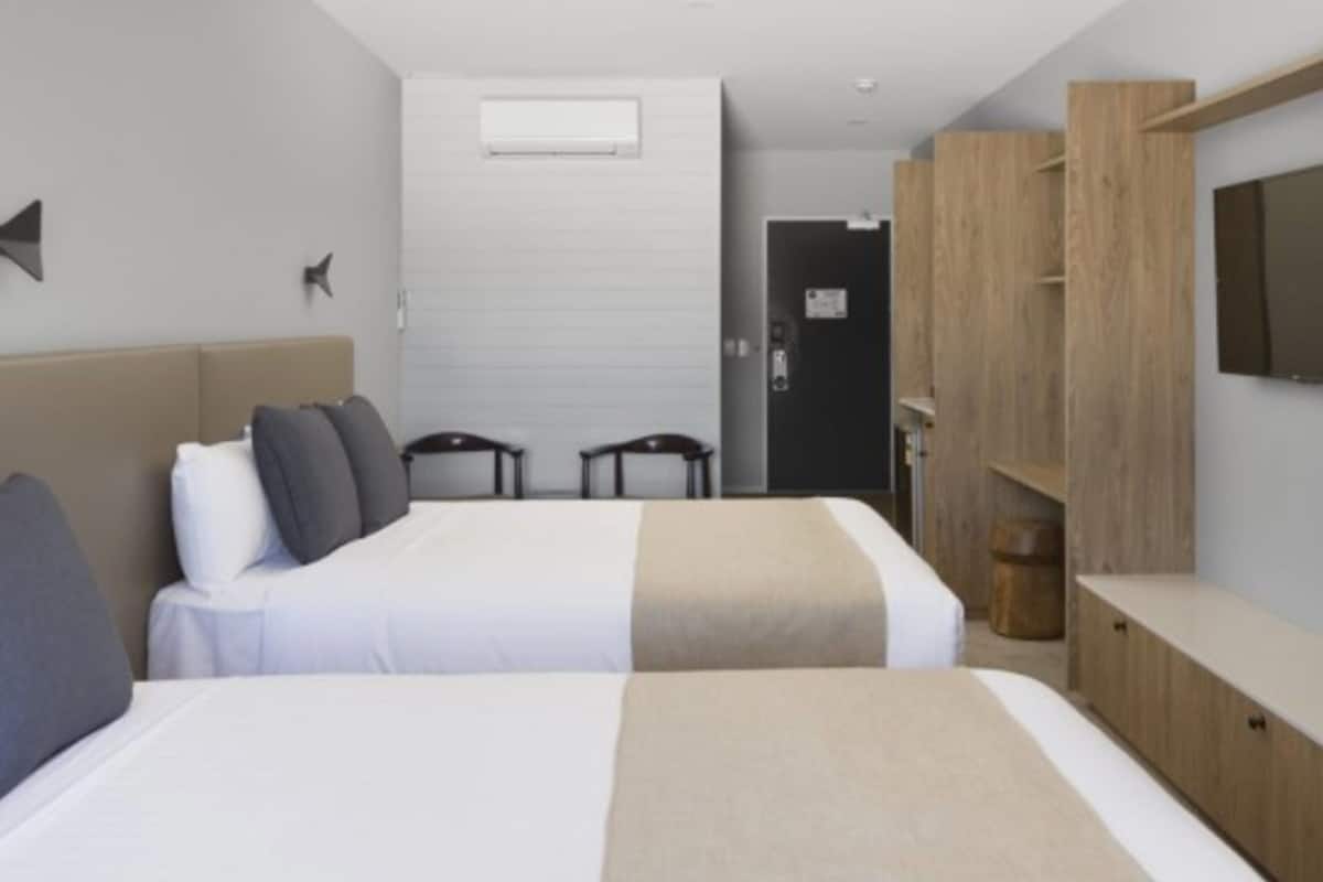 accessible room | desk, laptop workspace, blackout curtains, iron/ironing board