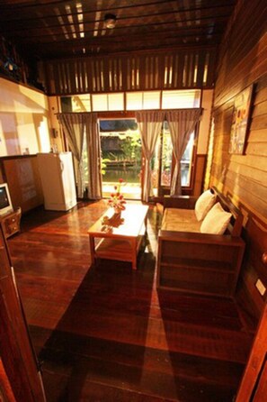 Chambre avec lits jumeaux, 2 lits une place | Salle de séjour