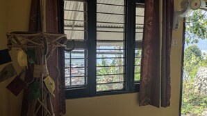 Camera Deluxe con letto matrimoniale o 2 letti singoli, balcone | Una scrivania, Wi-Fi gratuito