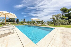 Seasonal outdoor pool, pool umbrellas, sun loungers