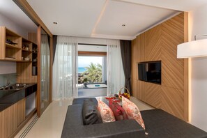 Luxury Beachfront Suite | Living area | Flat-screen TV - Kudo Hotel & Beach Club (Adults Only) (Patong)